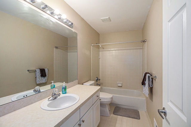 full bath featuring visible vents, bathing tub / shower combination, vanity, and toilet