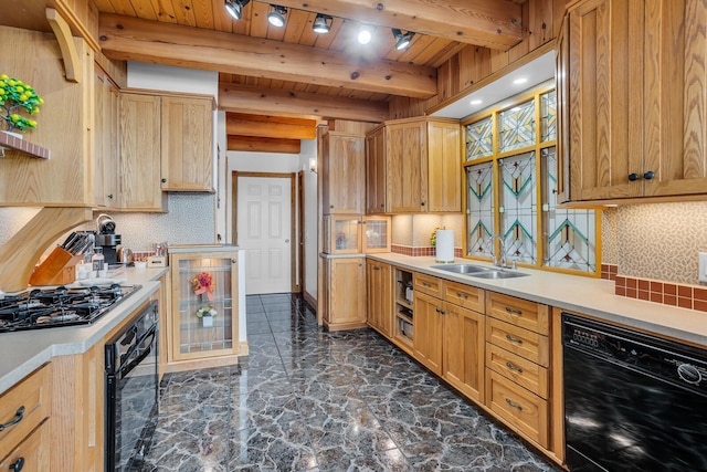 kitchen featuring a sink, light countertops, black appliances, and beam ceiling