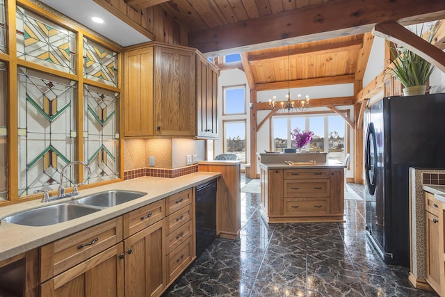 kitchen featuring wooden ceiling, a sink, a center island, black appliances, and an inviting chandelier