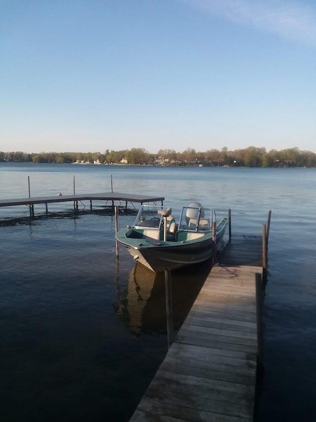 dock area featuring a water view