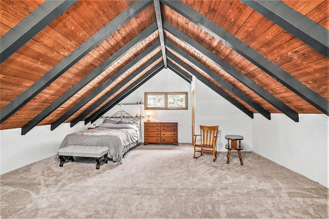 unfurnished bedroom with lofted ceiling with beams, wooden ceiling, and carpet flooring