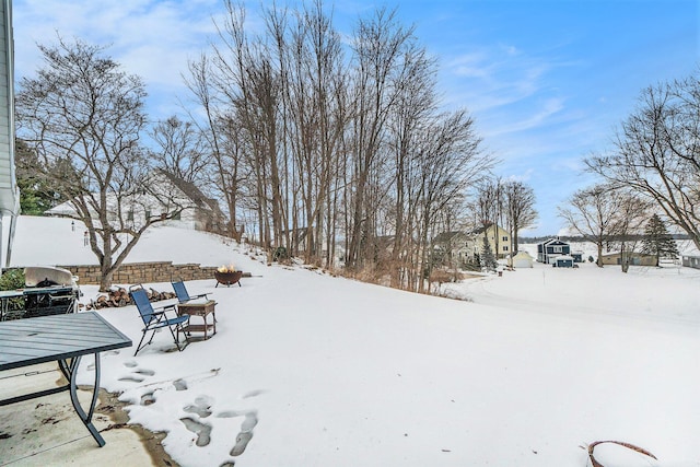 view of snowy yard