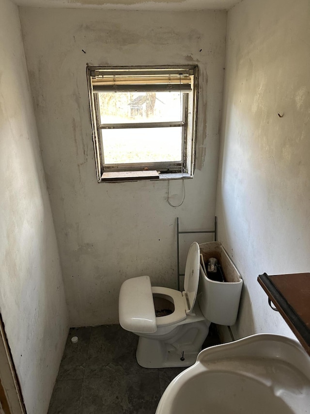 bathroom featuring toilet