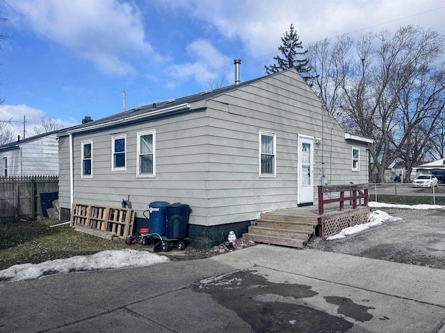 view of front of home with fence