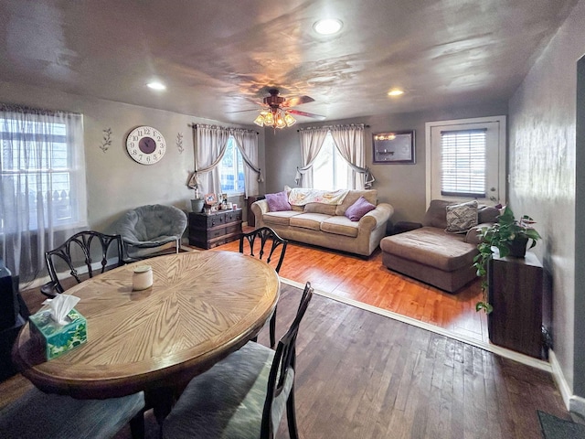 dining area featuring hardwood / wood-style flooring, ceiling fan, and recessed lighting