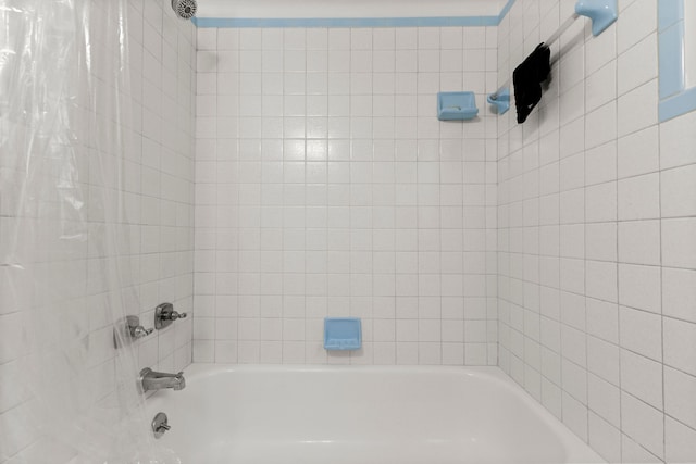 full bath featuring bathing tub / shower combination