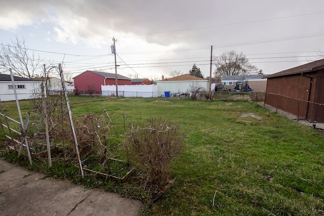 view of yard featuring fence