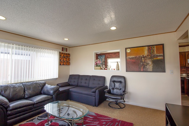 carpeted living area with recessed lighting, a textured ceiling, visible vents, and baseboards