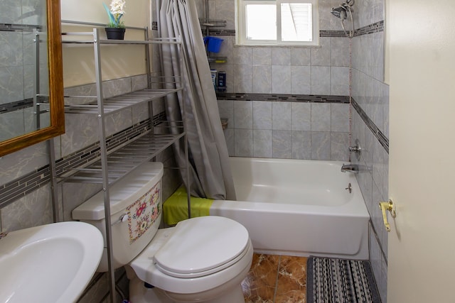 bathroom featuring toilet, shower / bath combination with curtain, and marble finish floor