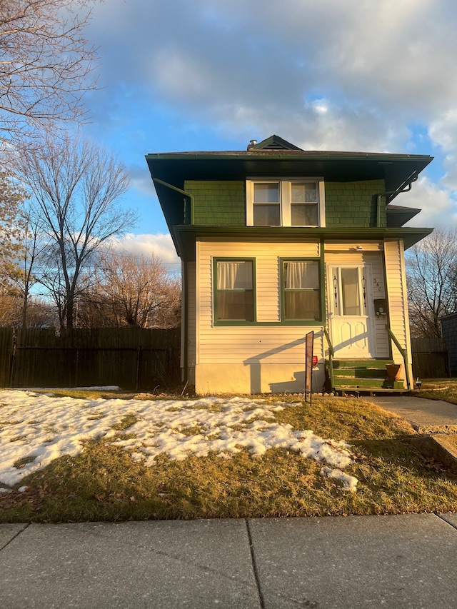 view of front of home with fence