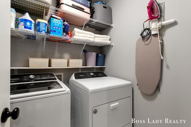 washroom featuring laundry area and washer and clothes dryer