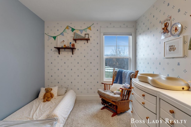 bedroom featuring wallpapered walls, carpet, and baseboards