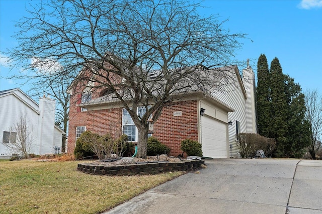 view of front of house with driveway, an attached garage, a front yard, and brick siding