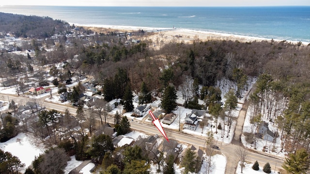 aerial view featuring a water view and a view of the beach