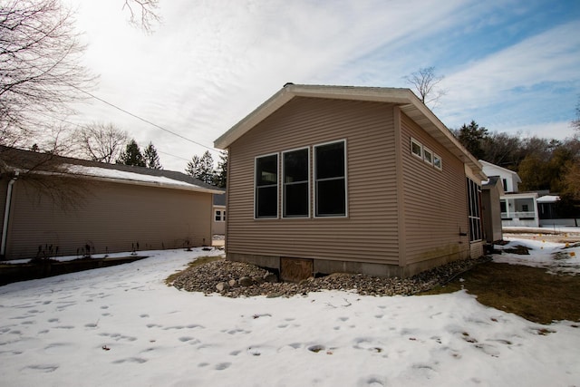 view of snow covered property