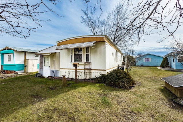 view of front of home with a front yard