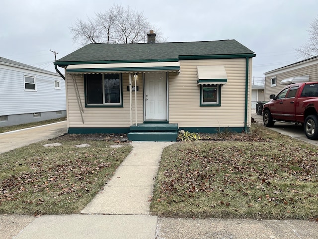 bungalow with roof with shingles