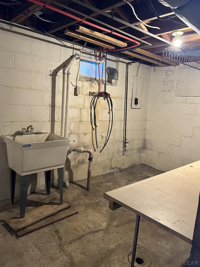 below grade area featuring a sink