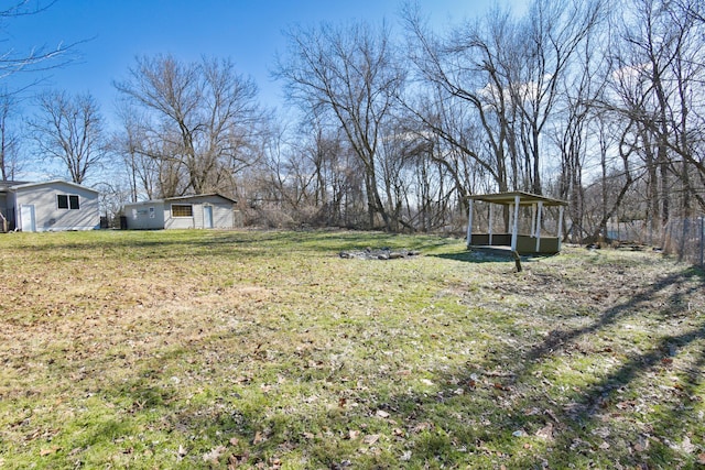 view of yard with fence