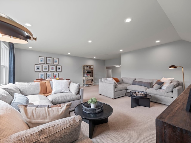 living area featuring recessed lighting and carpet flooring