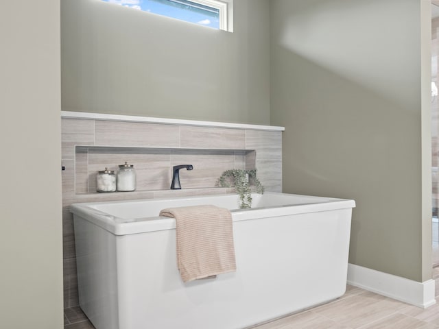 bathroom featuring baseboards