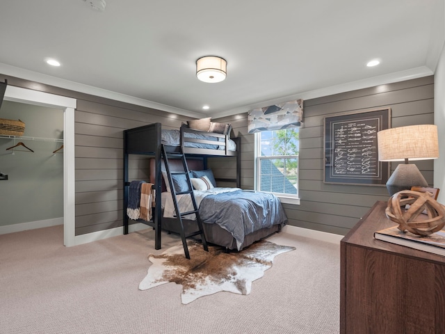 bedroom with baseboards, recessed lighting, carpet flooring, and crown molding