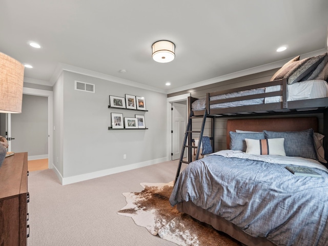 bedroom with recessed lighting, carpet floors, visible vents, baseboards, and ornamental molding