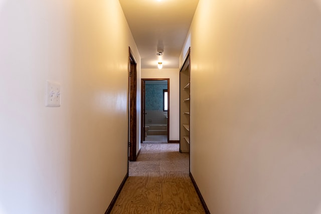 corridor with baseboards