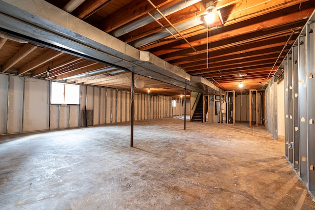 basement featuring stairs