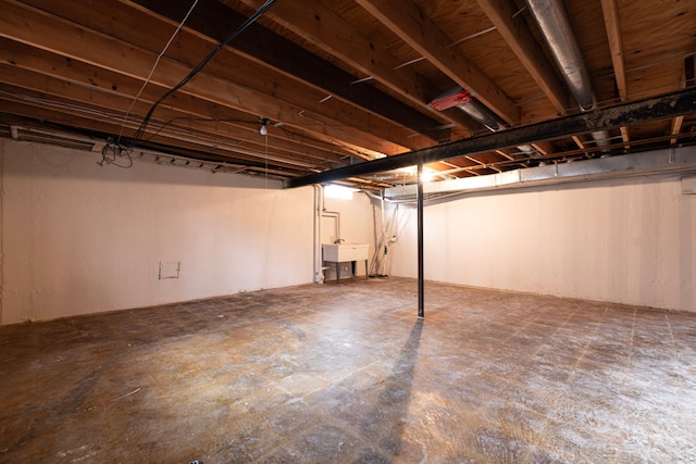 unfinished basement with a sink