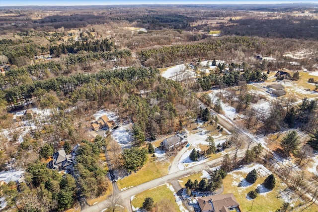 aerial view with a wooded view