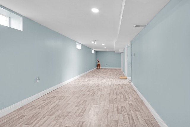 interior space with recessed lighting, visible vents, baseboards, and light wood finished floors