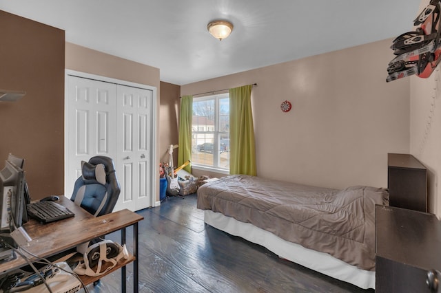 bedroom featuring a closet and wood finished floors