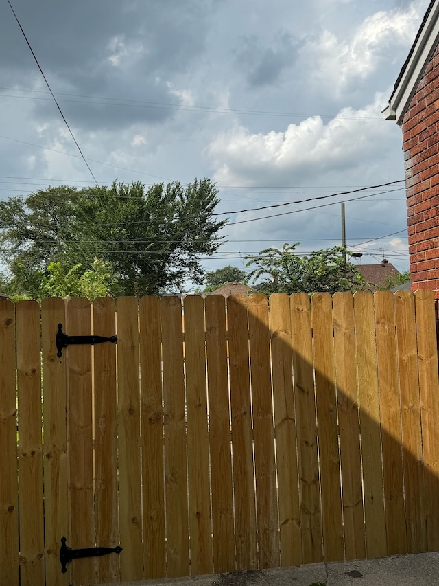 14919 Fairmount Dr, Detroit, MI 48205 - view of gate featuring fence