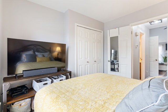 bedroom featuring a closet and wood finished floors