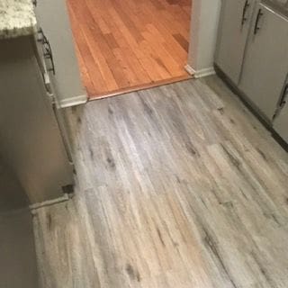 30200 Southfield Rd Unit 204, Southfield, MI 48076 - detailed view of wood finished floors and baseboards
