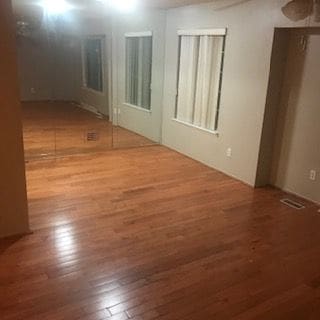 30200 Southfield Rd Unit 204, Southfield, MI 48076 - spare room featuring wood finished floors and a ceiling fan