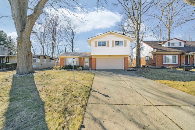 view of front of property with a front lawn, an attached garage, brick siding, and driveway