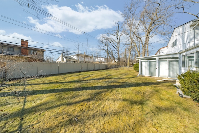 view of yard featuring fence