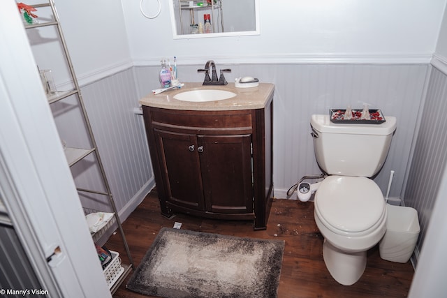 5324 Buchanan Ave, Warren, MI 48092 - bathroom featuring wainscoting, toilet, and wood finished floors