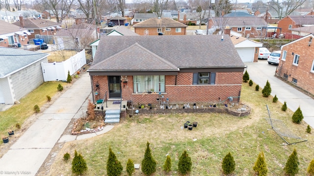 view of front facade with brick siding and a residential view