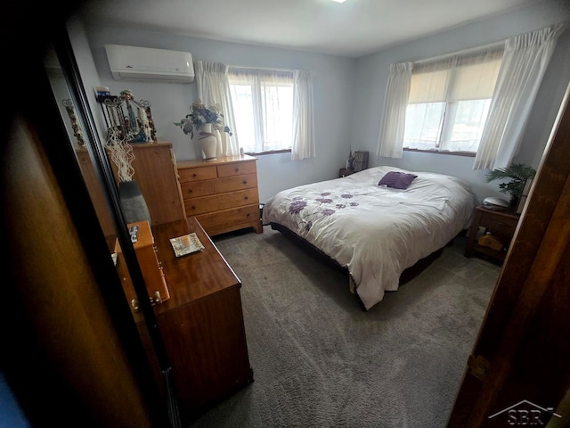 carpeted bedroom with a wall mounted air conditioner