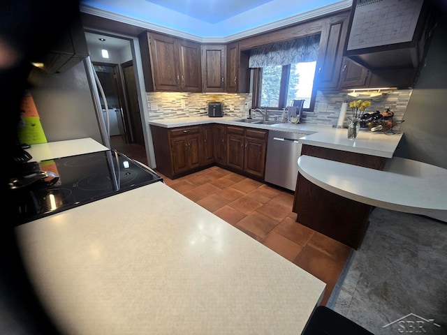 kitchen with light countertops, black range with electric stovetop, backsplash, a sink, and dishwasher