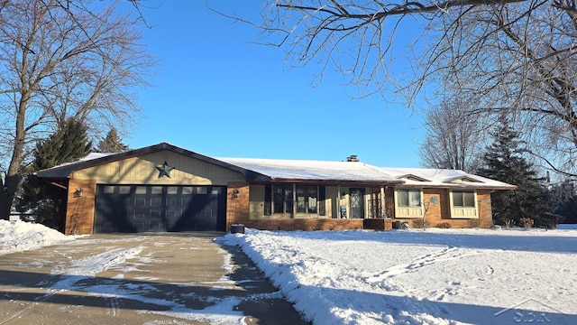 view of front facade with an attached garage and driveway