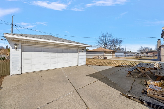 detached garage with fence