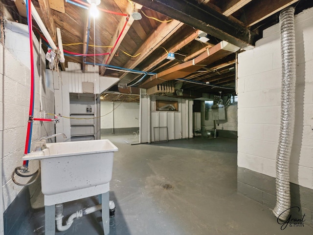 unfinished basement with a sink