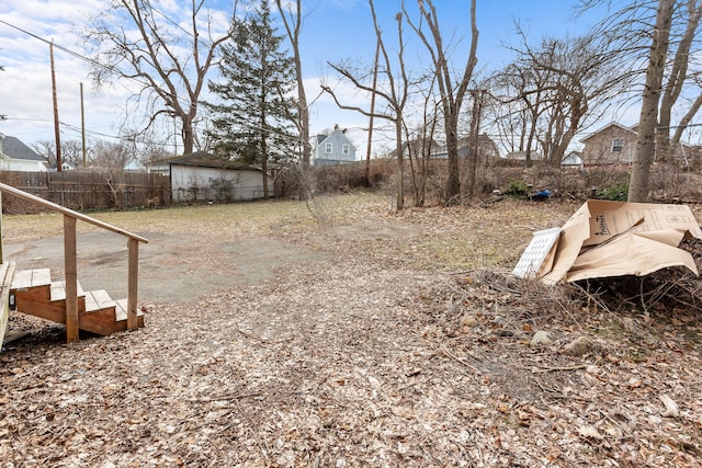 view of yard featuring fence