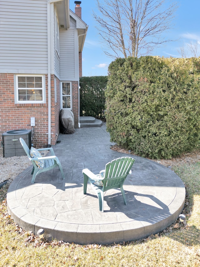 view of patio with central AC unit