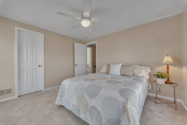 bedroom with visible vents, ceiling fan, baseboards, and carpet floors