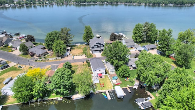 aerial view with a residential view and a water view